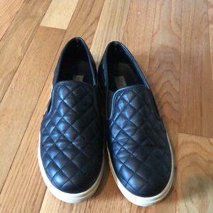 Black Steve Madden slip ons